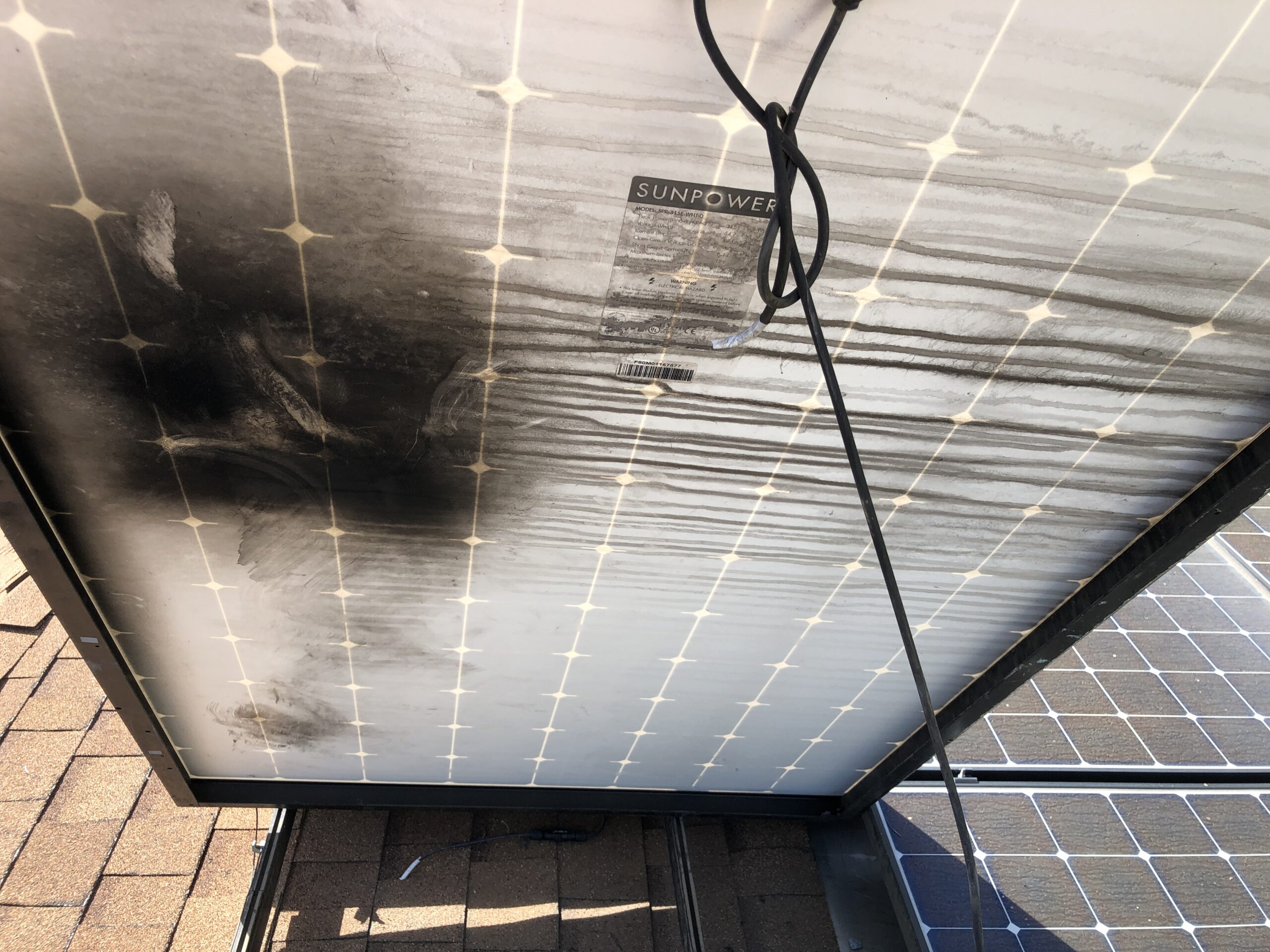 Damaged solar panel being repaired by Transform Power