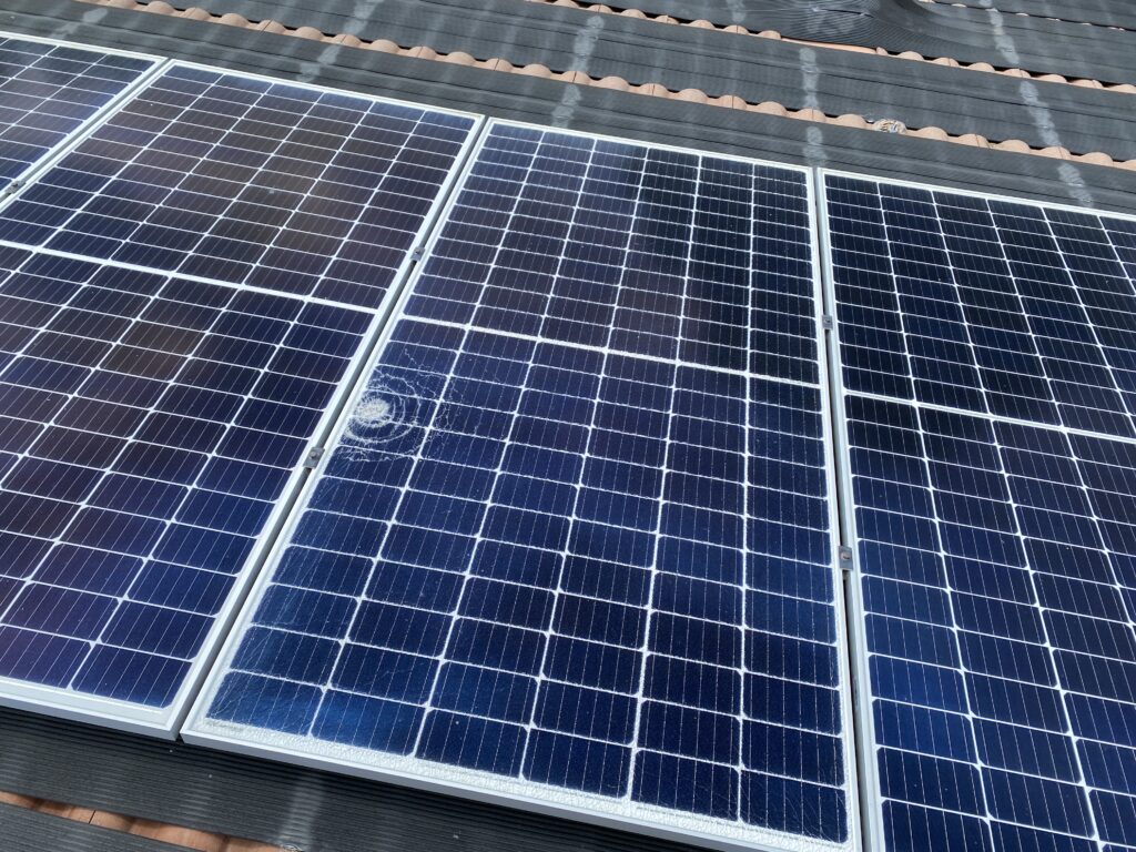 broken solar panel in need of repair