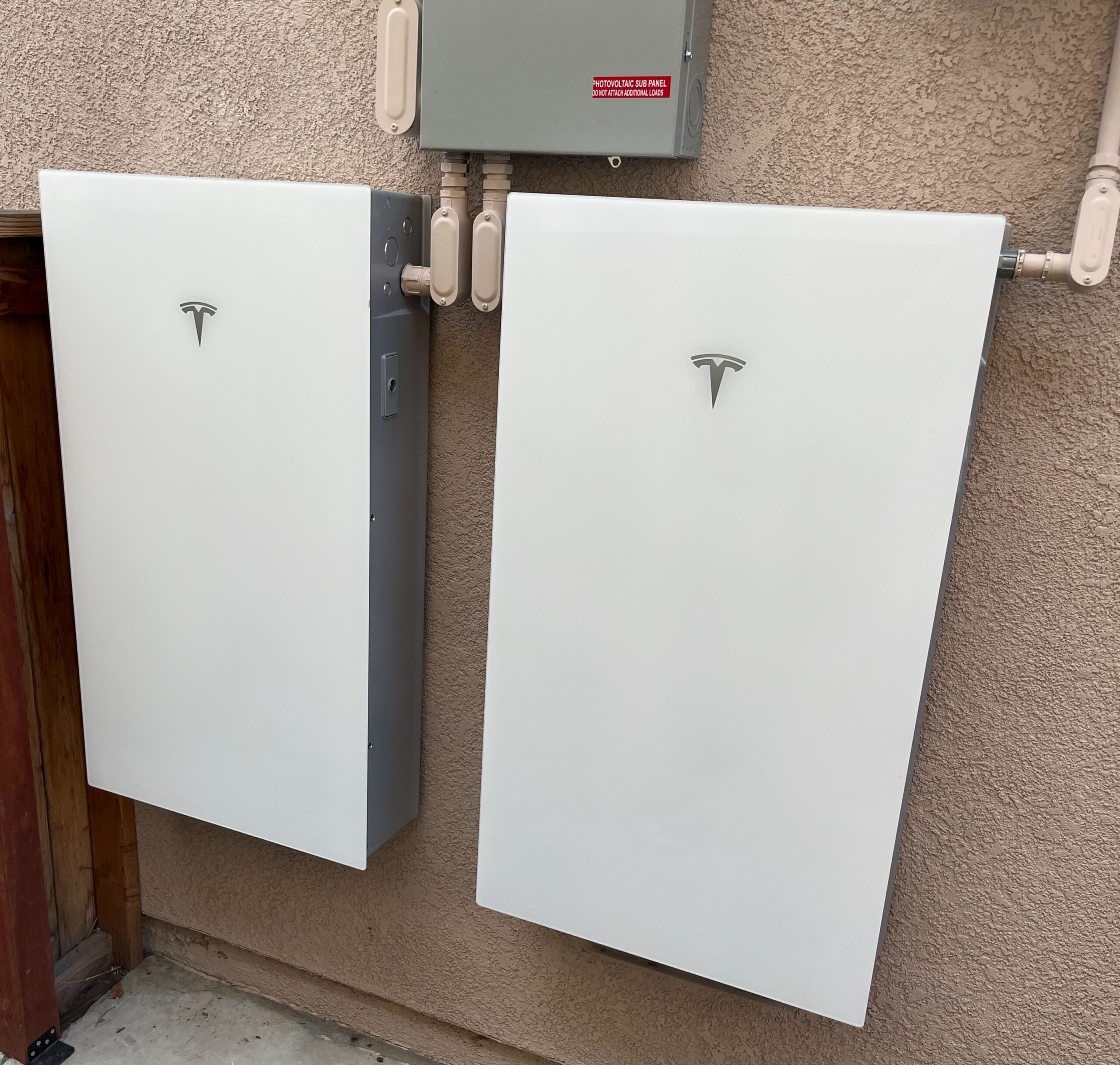 Multiple Tesla solar back up batteries installed by Transform Power